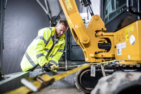 mini excavator secure|how to tie an excavator.